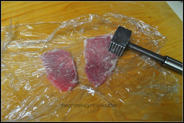 Pounding the pork thin with a meat mallet helps tenderize the meat.