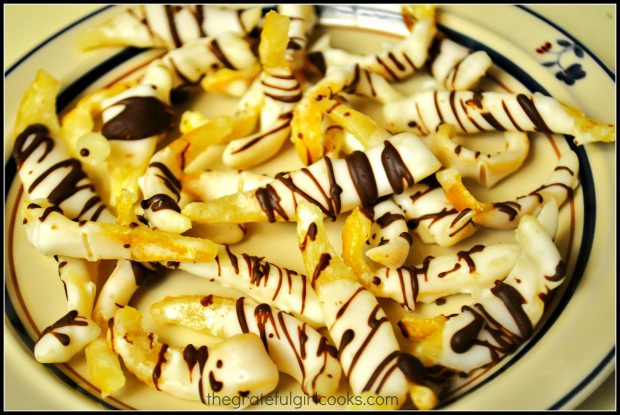 Candied Citrus Peels from lemons, dipped in white chocolate then drizzled with semi-sweet chocolate.