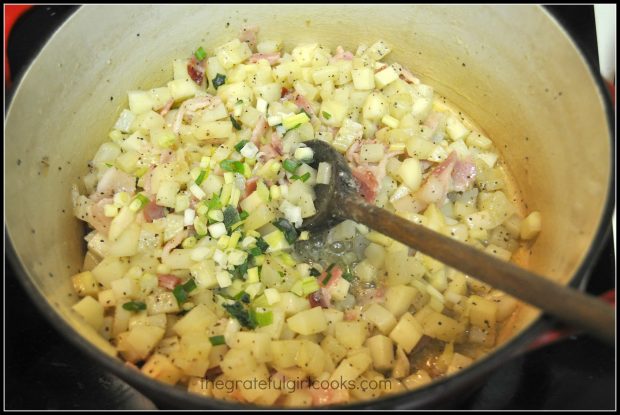 Potatoes are cooked with green onions, bacon, etc. for soup