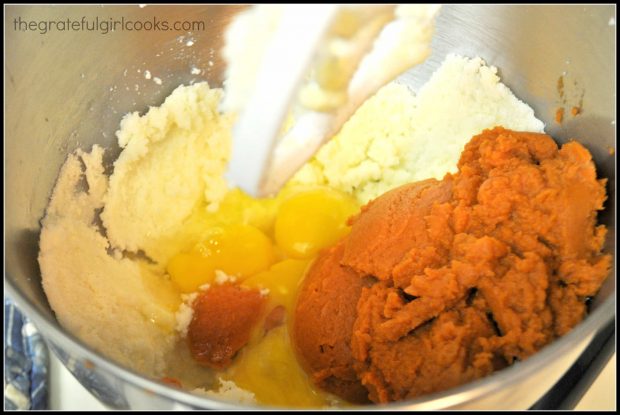 Ingredients for pumpkin streusel coffeecake batter are mixed in large bowl.