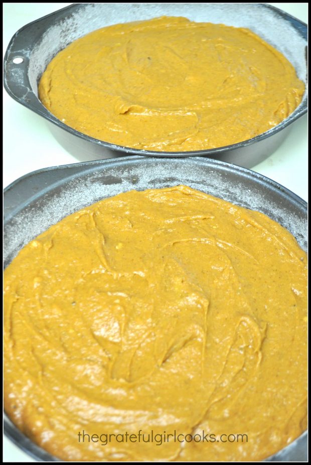 Pumpkin Streusel Coffeecake batter is divided into two cake pans.