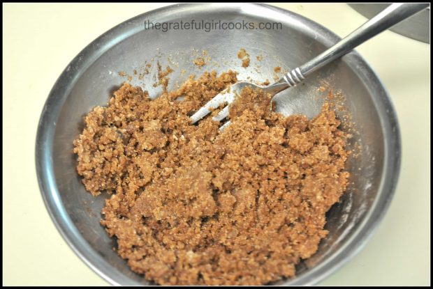Buttery streusel topping is mixed before adding to pumpkin streusel coffeecake batter.