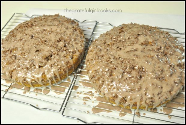 Cinnamon icing is drizzled over both of the pumpkin streusel coffeecakes once baked.