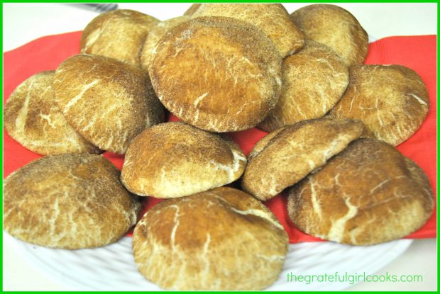 Snickerdoodles are piled up on a plate, ready to eat!