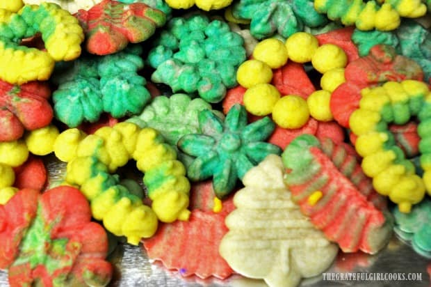 Different colors and shapes of holiday spritz cookies.