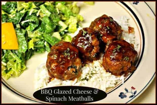 You'll enjoy yummy baked BBQ glazed cheese spinach meatballs, w/ cheddar and spinach, glazed with a homemade sweet, tangy sauce.