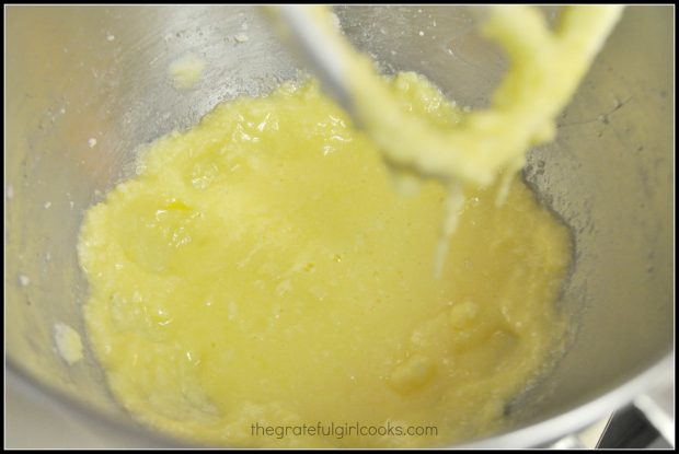 Butter and granulated sugar are mixed to begin batter for chocolate crinkle cookies.