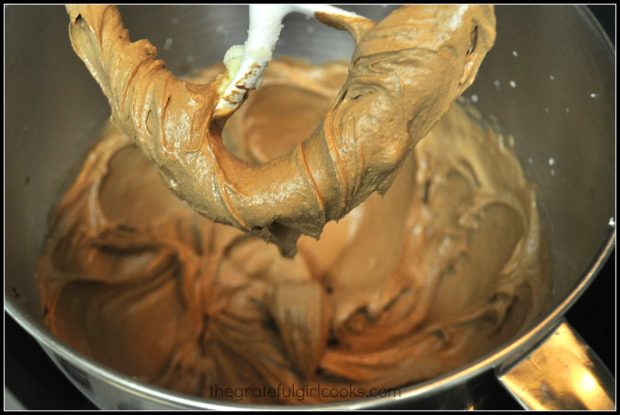 After chocolate is added to cookie dough, the batter for chocolate crinkle cookies turns brown.