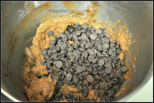 Chocolate chips are added to the batter for the chocolate crinkle cookies.