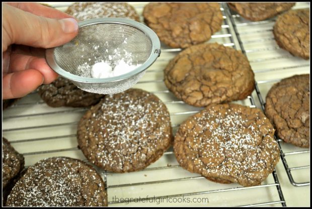 Chocolate Crinkle Cookies are topped with sifted powdered sugar, to finish them off before eating.