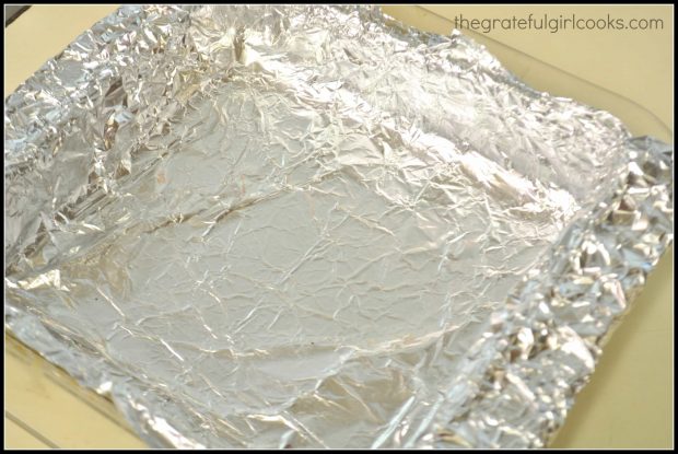 Line 8x8 pan with aluminum foil for lemon bar filling