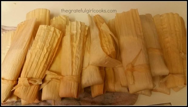 Stuffed Pork tamales are filled and tied before cooking
