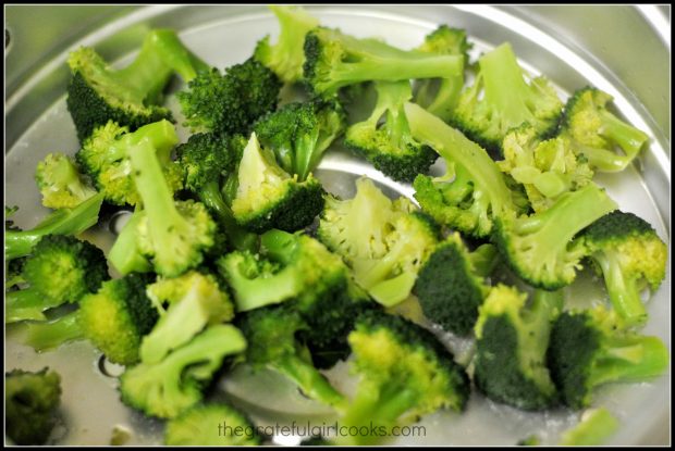 Broccoli is cooked to add to the teriyaki chicken rice bowl.