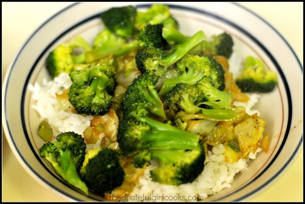 Cooked cabbage and steamed broccoli is added to the rice bowl.