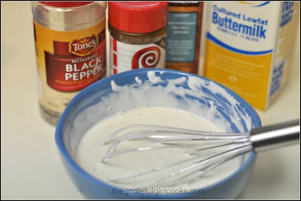 Buttermilk, sour cream, mayonnaise and spices are whisked together to make salad dressing.