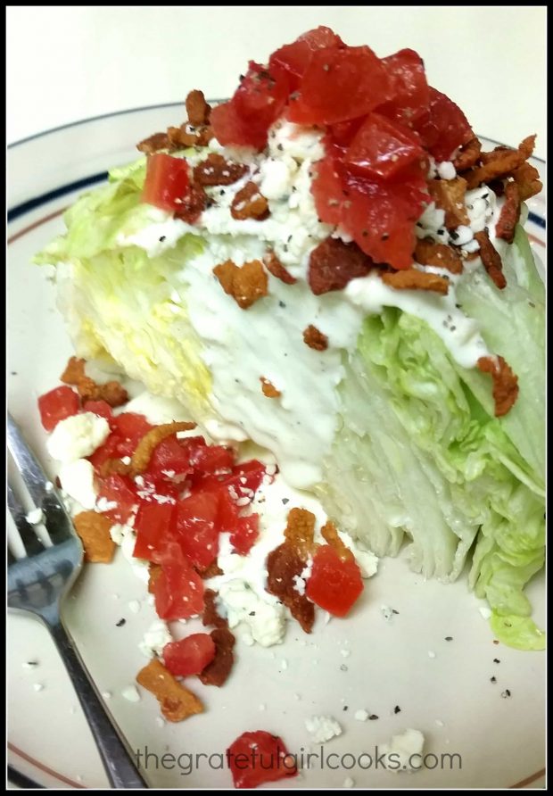 BLT Wedge Salad on plate with fork.