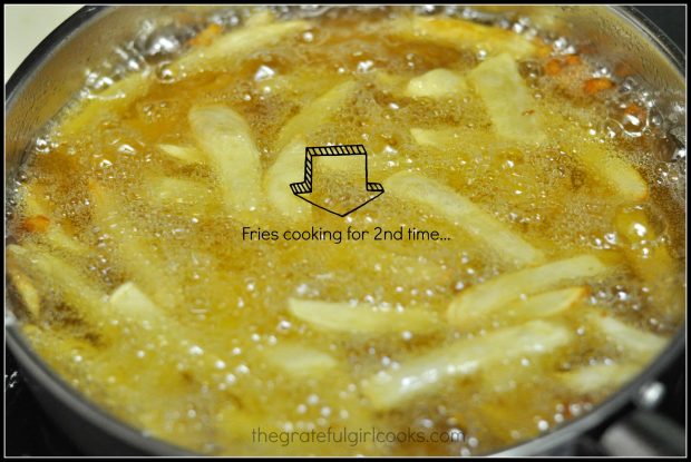 The "chips" (french fries) go back into hot oil for 2nd cooking