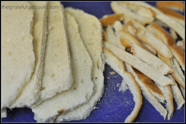 Crusts cut off bread for breakfast soufflê.