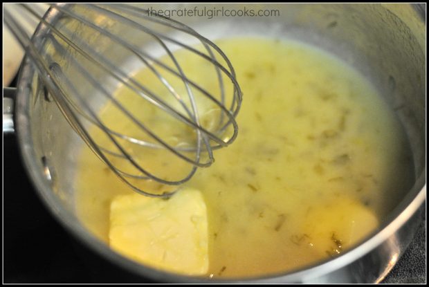 Cold butter is blended into sauce in pan