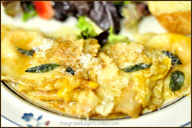 Close up photo of the finished ravioli dish on serving plate.