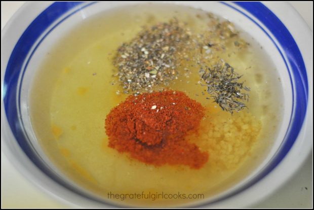 The ingredients for the salad dressing in a bowl, before blending them together.