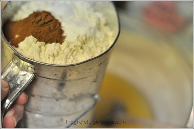 Flour and spices sifted into bowl