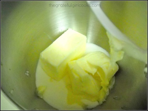 Butter in mixer with sugar, used to make dough for Spring flower sugar cookies.