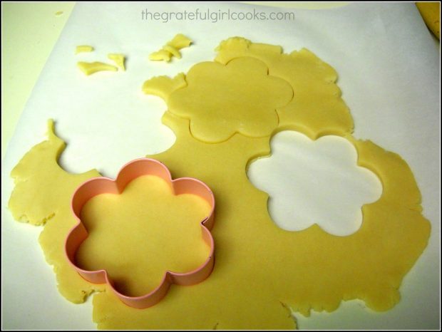 Flower shaped cookie cutter used to cut dough for Spring flower sugar cookies.