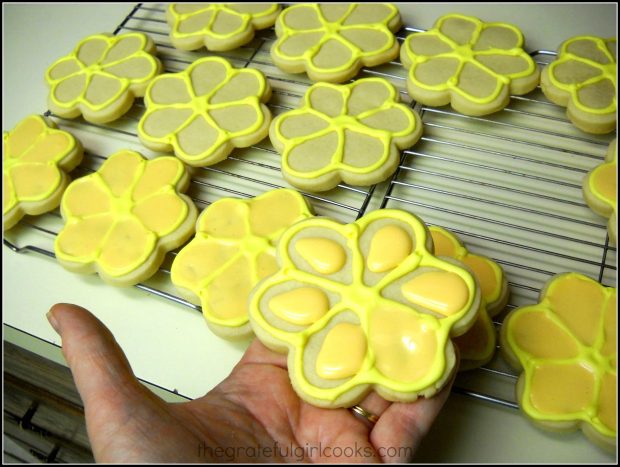 Light orange icing added to the Spring flower sugar cookies.