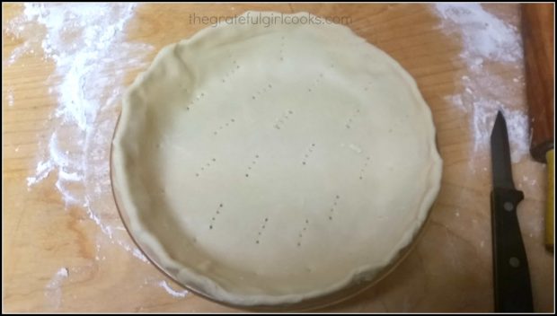 Dough in pan is ready to make the crust.