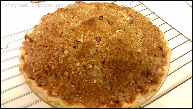 Dutch Crumb Apple Pie is golden brown on top after it comes out of oven.