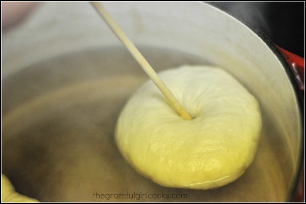 Chopsticks were used to flip bagels during the boiling process.