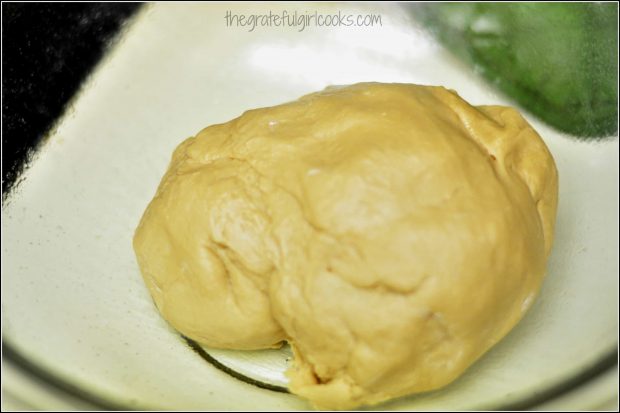 Dough for maple twists sits to let it rise before making pastries.