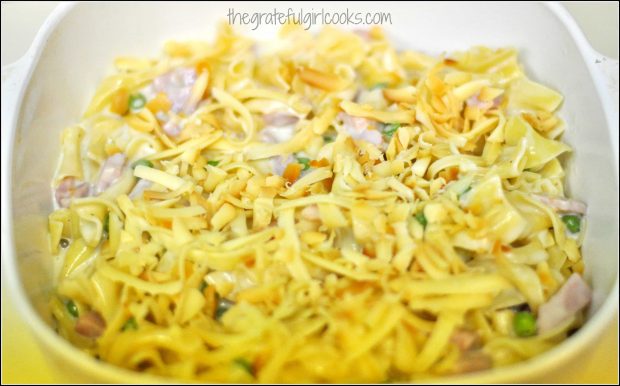 Casserole is topped with Gruyere cheese and bread crumbs before baking.