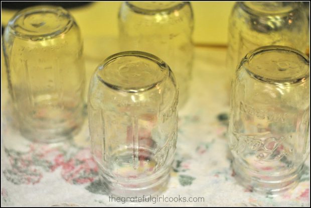 Jars are cleaned and heated prior to filling them up with salsa.