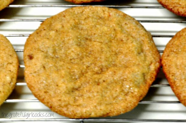 Close up photo of butter pecan crisps on wire rack.