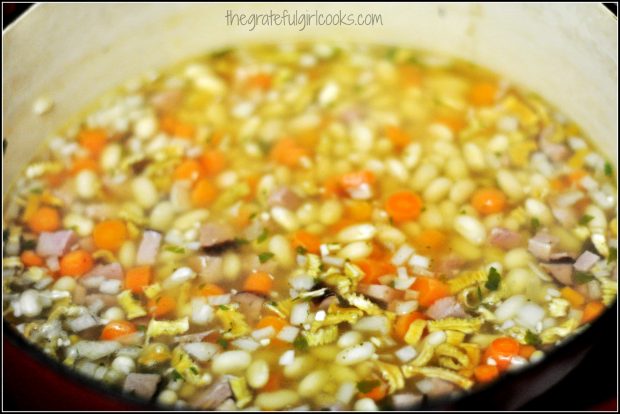 Ham and Bean Soup (and how to CAN it!) / The Grateful Girl Cooks! Beans, ham, carrots, celery and onion for soup, cooking in pan