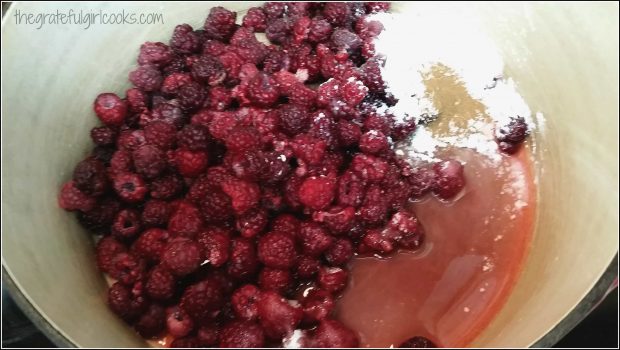 Fresh raspberries mixed with sugar, cinnamon and cornstarch for pie filling.