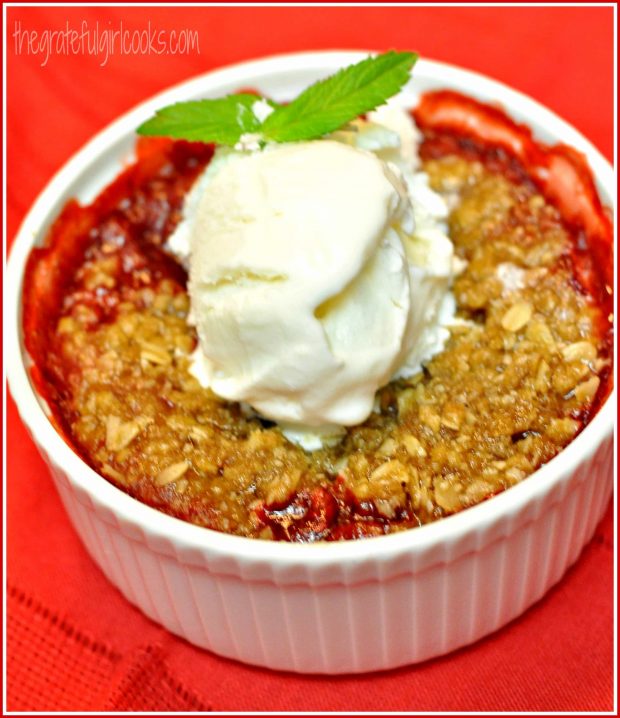 Strawberry cobbler, served with vanilla ice cream and mint sprig