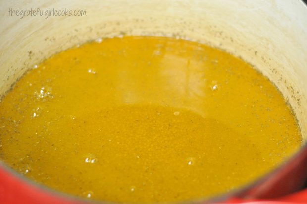 Brine for pickles is cooked in large saucepan