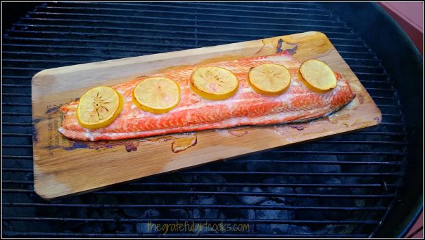 Grilled salmon is done cooking on cedar plank