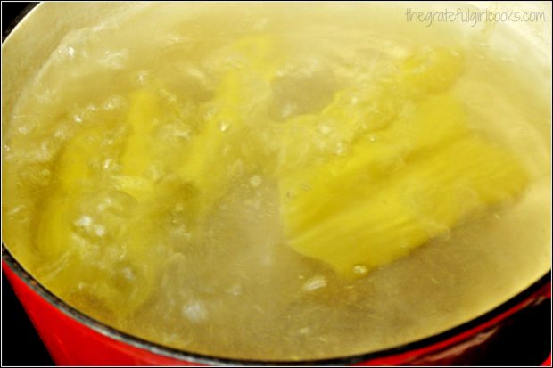 The pasta shells are cooked for 7 minutes in boiling, salted water.