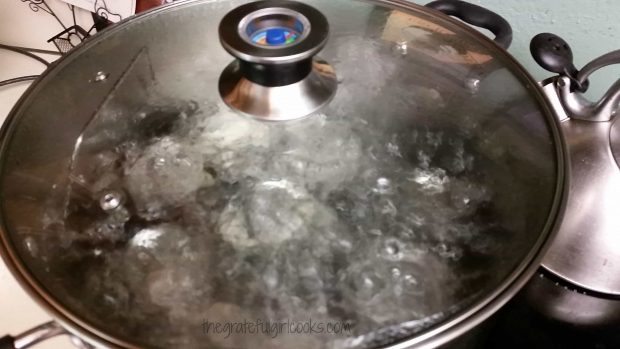 Jars are processed in a boiling water bath canner for 15 minutes.