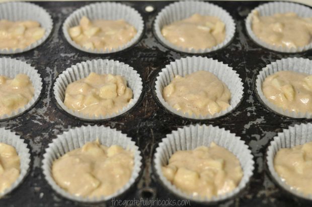 Batter in paper-lined muffin cup tins