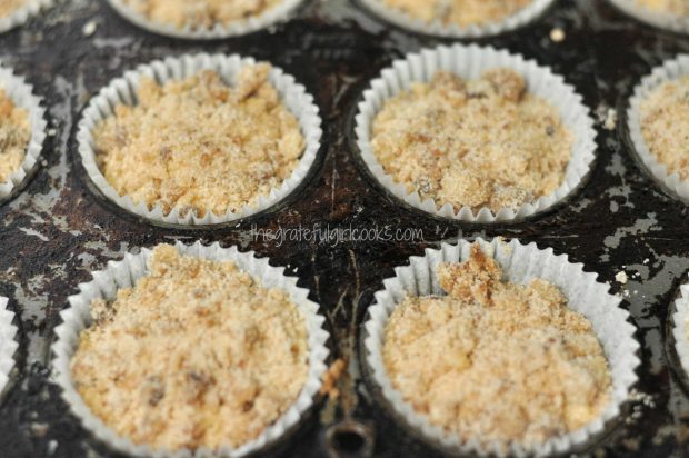 Batter with streusel on top in muffin tins