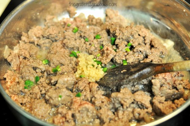 Ground beef, onions, garlic and jalapeno are cooked for chili mac