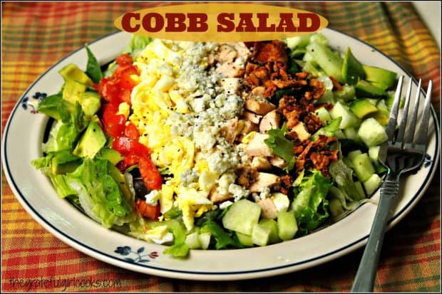 Cobb Salad is a delicious "all in one" meal, featuring chicken breast, chilled salad greens, bacon, avocado, bleu cheese crumbles, and crunchy veggies!