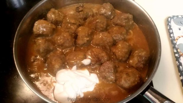 Sour cream is added to meatballs stroganoff and sauce at end of cooking time.