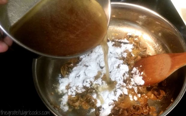 Beef broth is added to stroganoff sauce in skillet