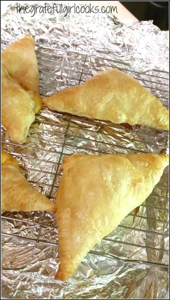 Peach Turnovers are baked, then cooled on wire rack.